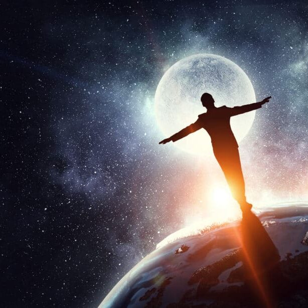 Silhouette of businessman standing on Earth planet. Elements of this image are furnished by NASA